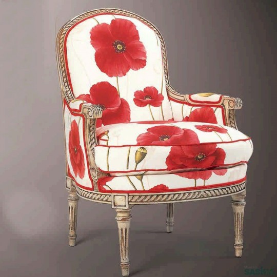 Exquisito sillón estilo louis xvi realizado en madera maciza haya. Acabado laca blanca desconchada, tejido coquelicot.
